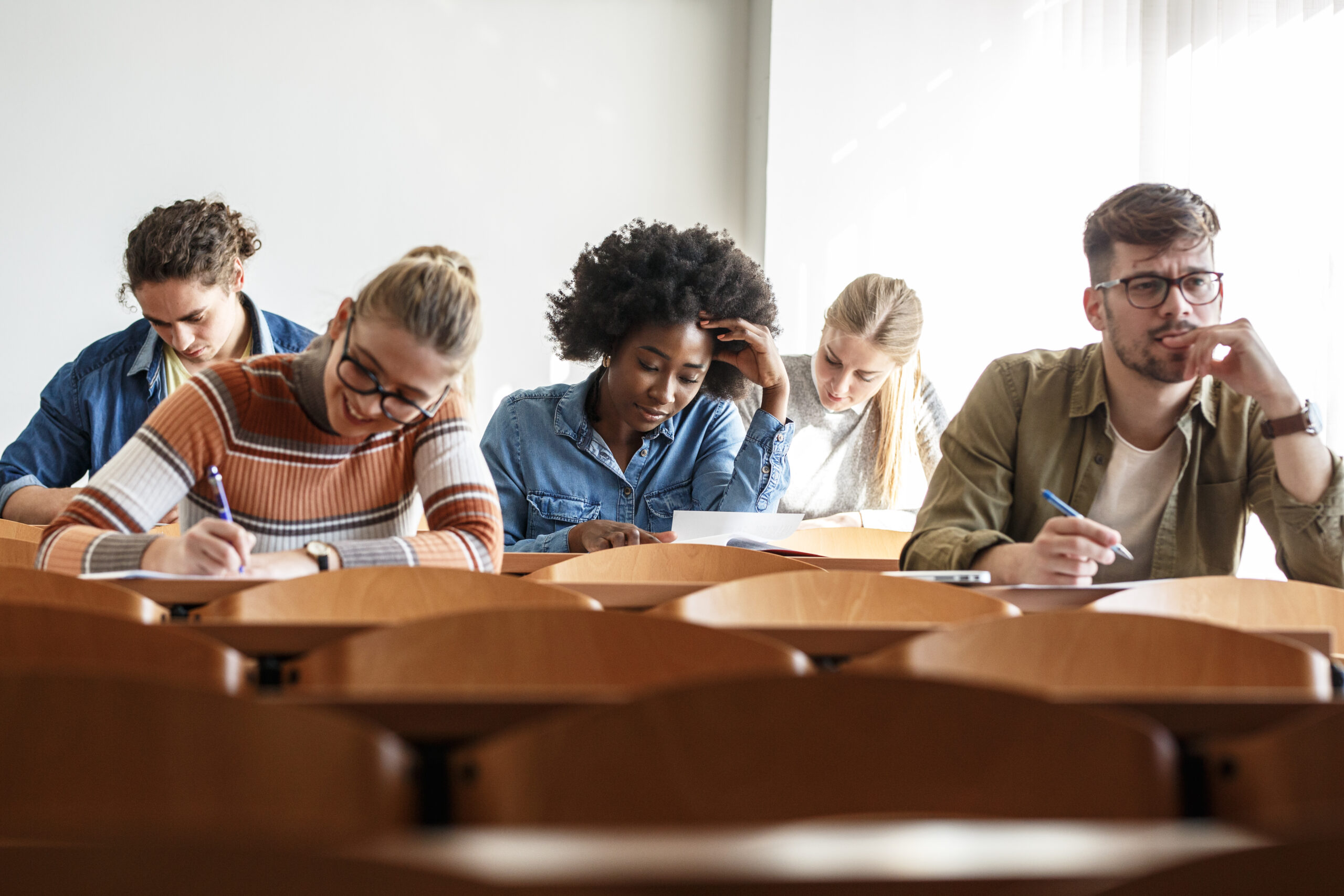Image of students struggling with a med school assessment in class